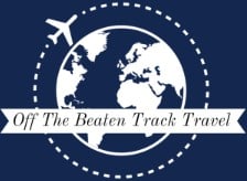 Logo of Off The Beaten Track Travel featuring a globe and airplane icon, emphasizing luxury travel planning services and bespoke travel experiences.